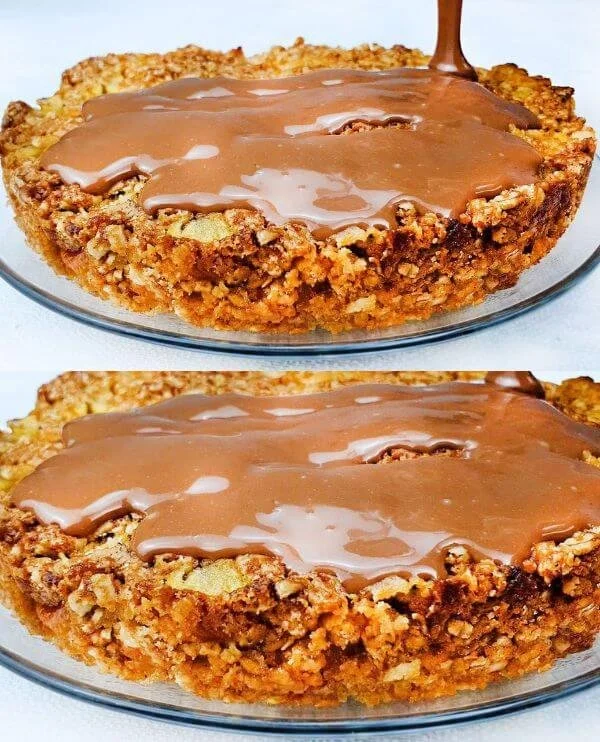 Slice of moist Oatmeal Apple Cake with apples and cinnamon, served on a plate.