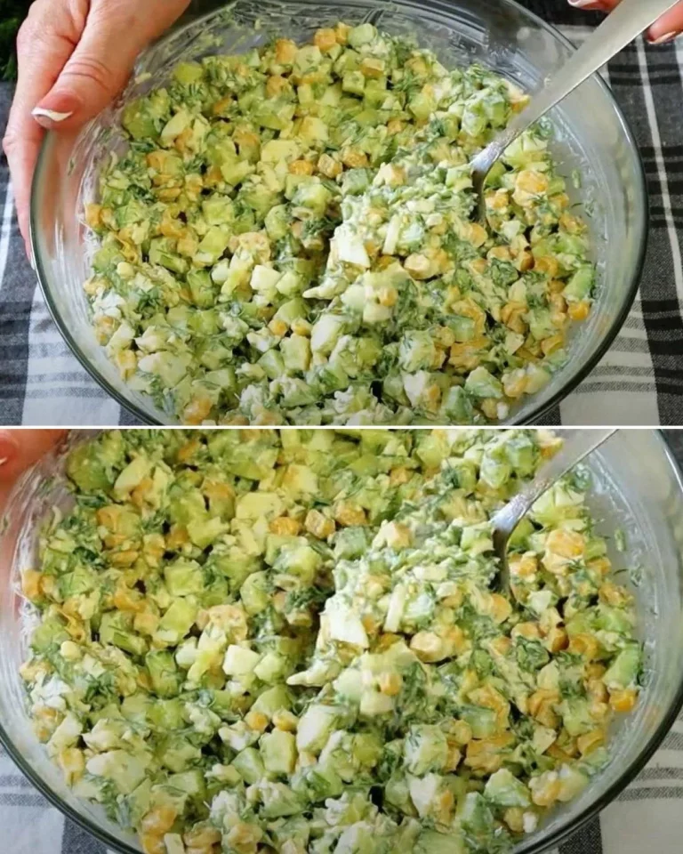 Fresh cucumber salad with herbs and dressing in a bowl