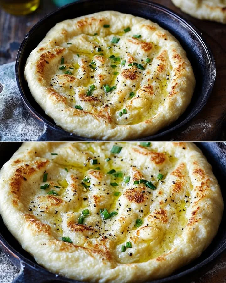 Homemade Garlic Naan cooked in a pan, golden and fluffy bread with garlic.