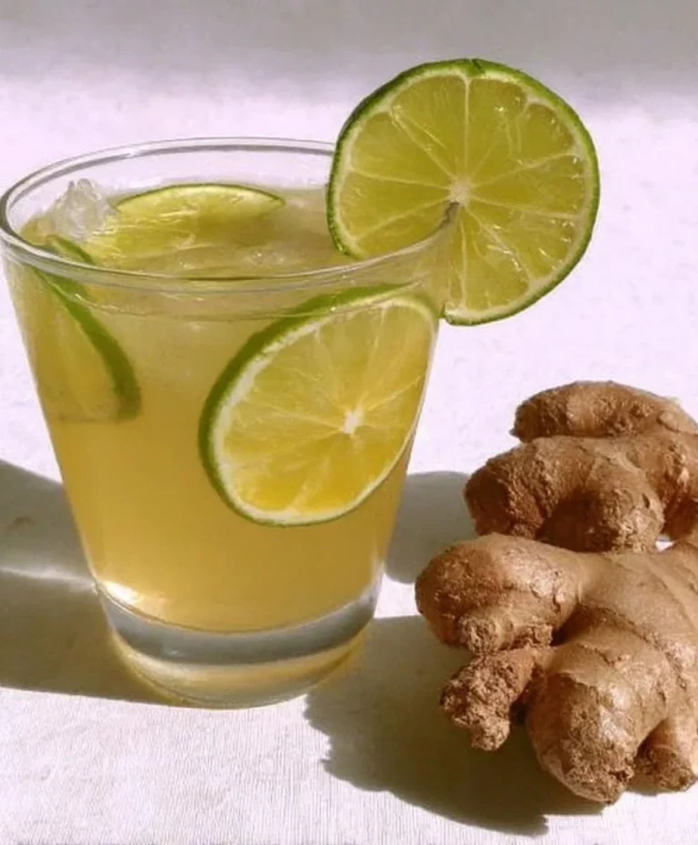 A glass of ginger water, a natural drink for weight loss benefits.
