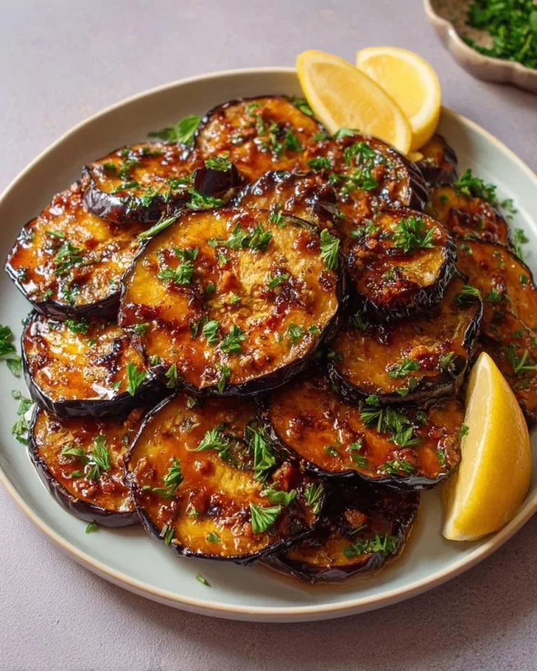 Perfectly grilled eggplant slices served on a plate
