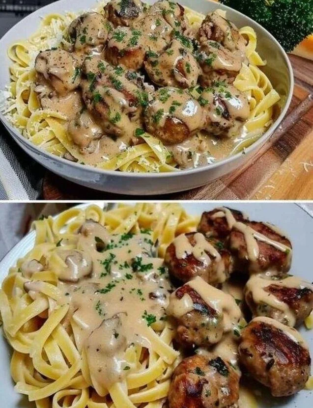 Plate of meatballs in creamy mushroom sauce with tagliatelle pasta