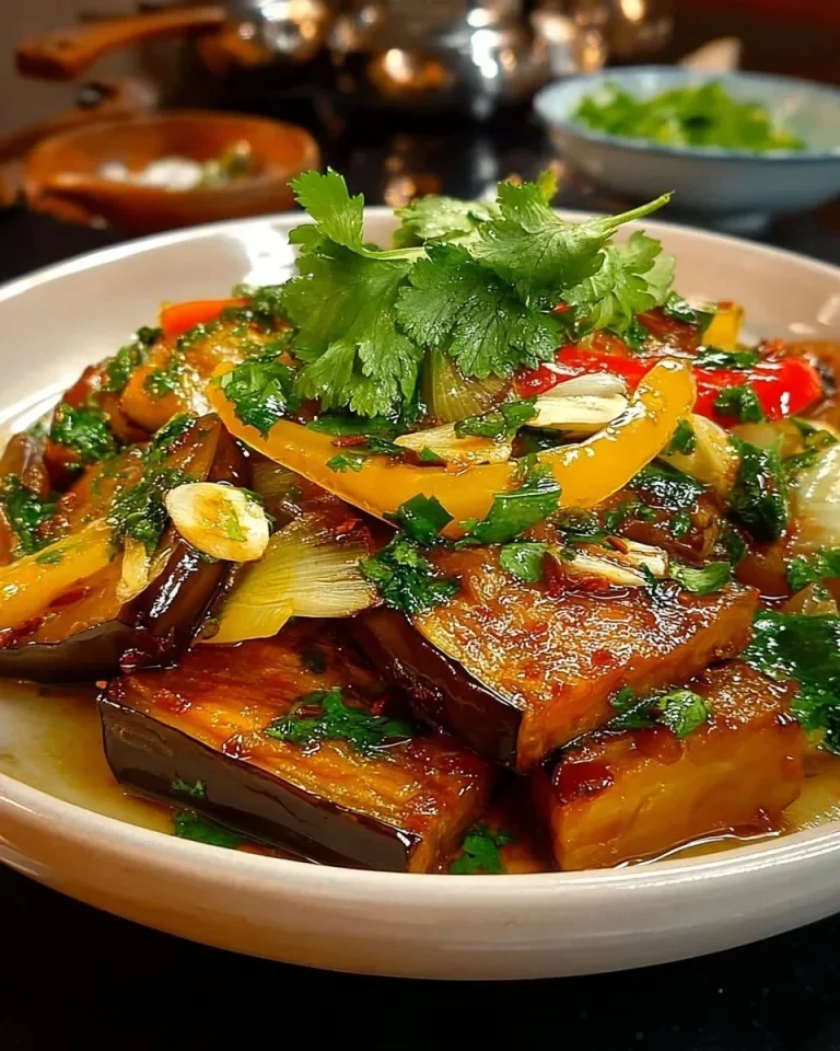 Marinated eggplant and peppers ready for grilling