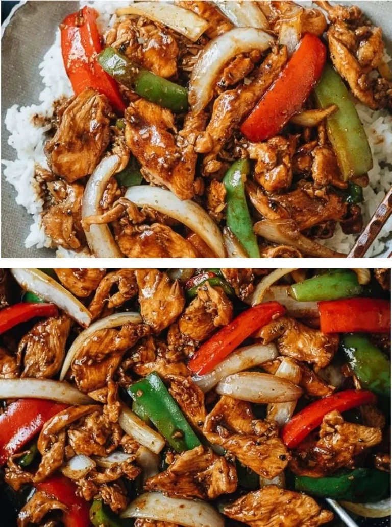 Delicious black pepper chicken ready to serve with colorful vegetables.