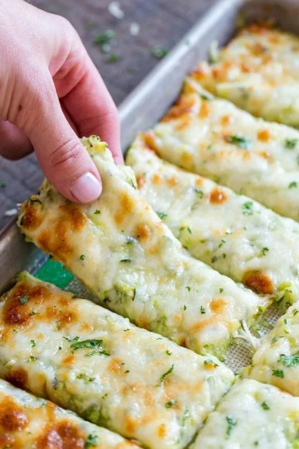 Cheesy zucchini breadsticks, a delicious and healthy snack option.
