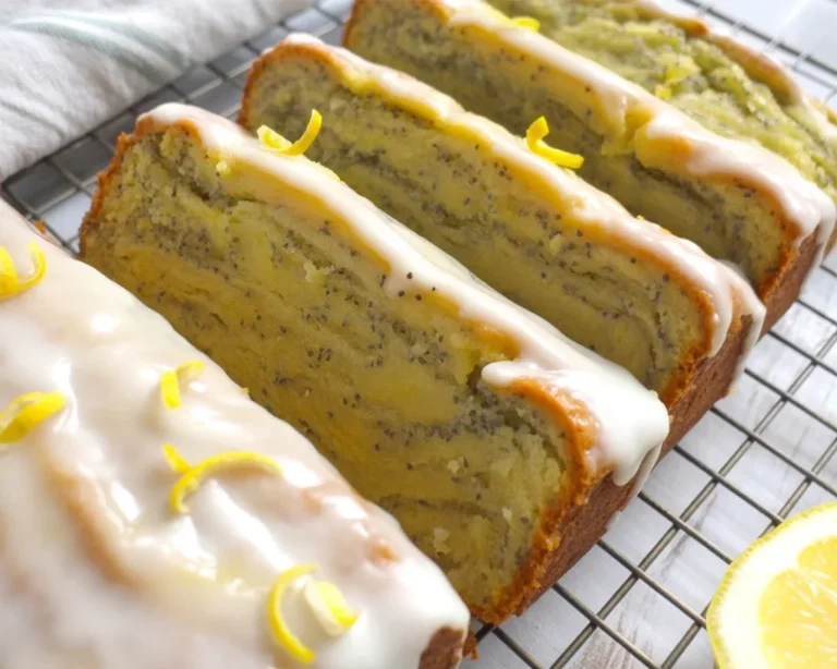 Moist and fluffy lemon poppy seed protein bread topped with fresh lemon slices.