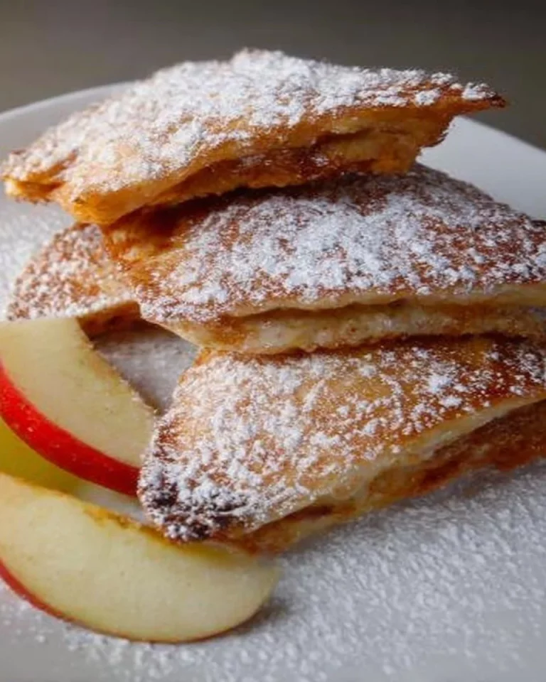 Delicious Apple Toast topped with ground cinnamon, perfect for breakfast.