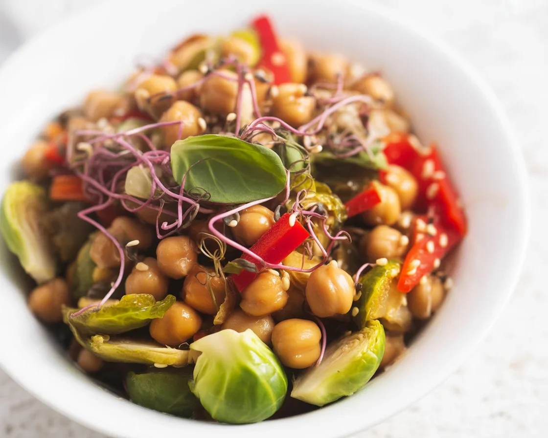Chickpea veggie stir fry with colorful vegetables and a savory sauce.