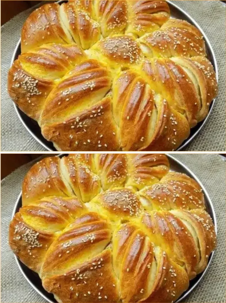 Freshly baked layered yeast rolls on a wooden table