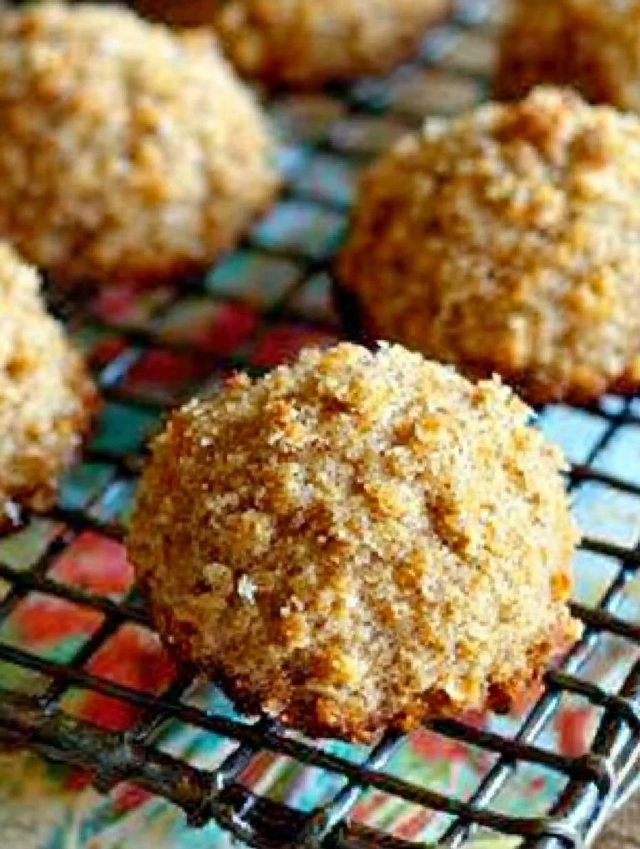 Baked apple almond flour cookies displayed on a baking tray.