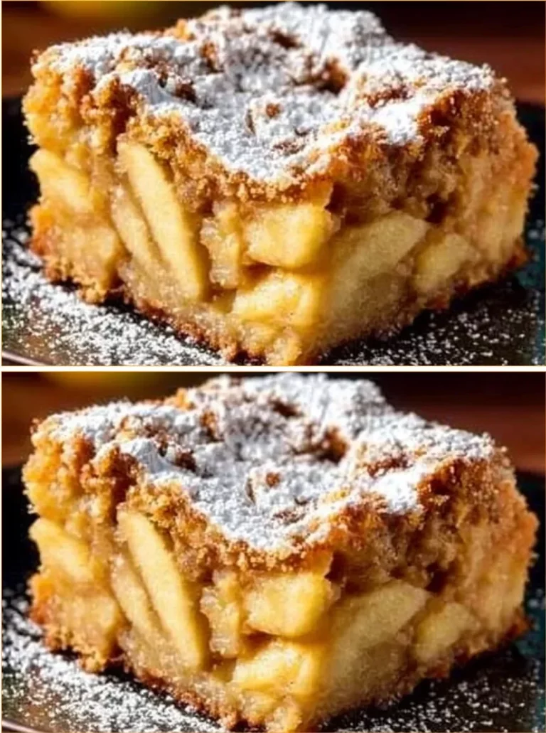 Delicious slice of apple pie cake topped with whipped cream
