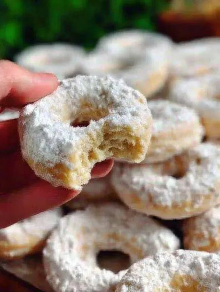 Delicious Christmas cookies topped with whipped cream for holiday festivities