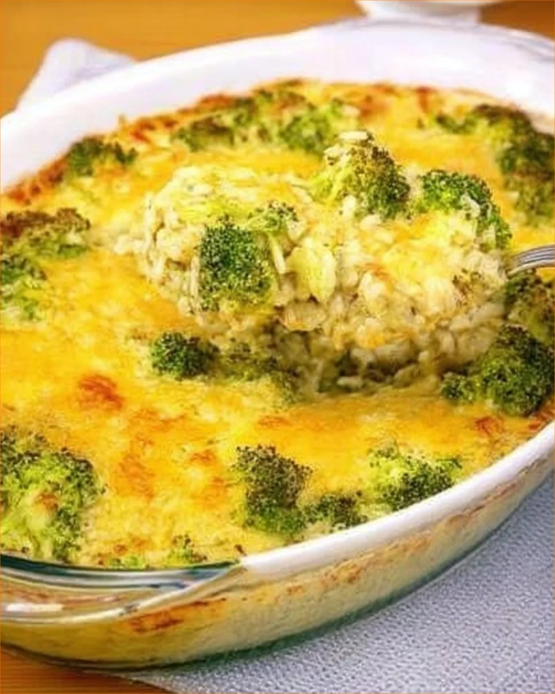 A hearty Broccoli Mushroom Rice Bake served in a baking dish, garnished with fresh herbs.