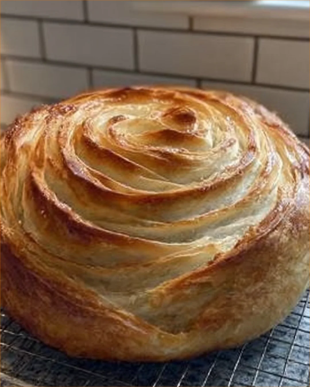 Croissant-Style Sourdough Loaf with a flaky exterior and soft interior