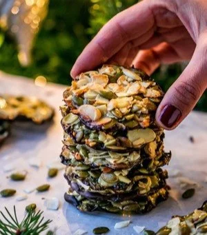 Crunchy almond seed chocolate cookies on a plate, gluten-free and vegan options