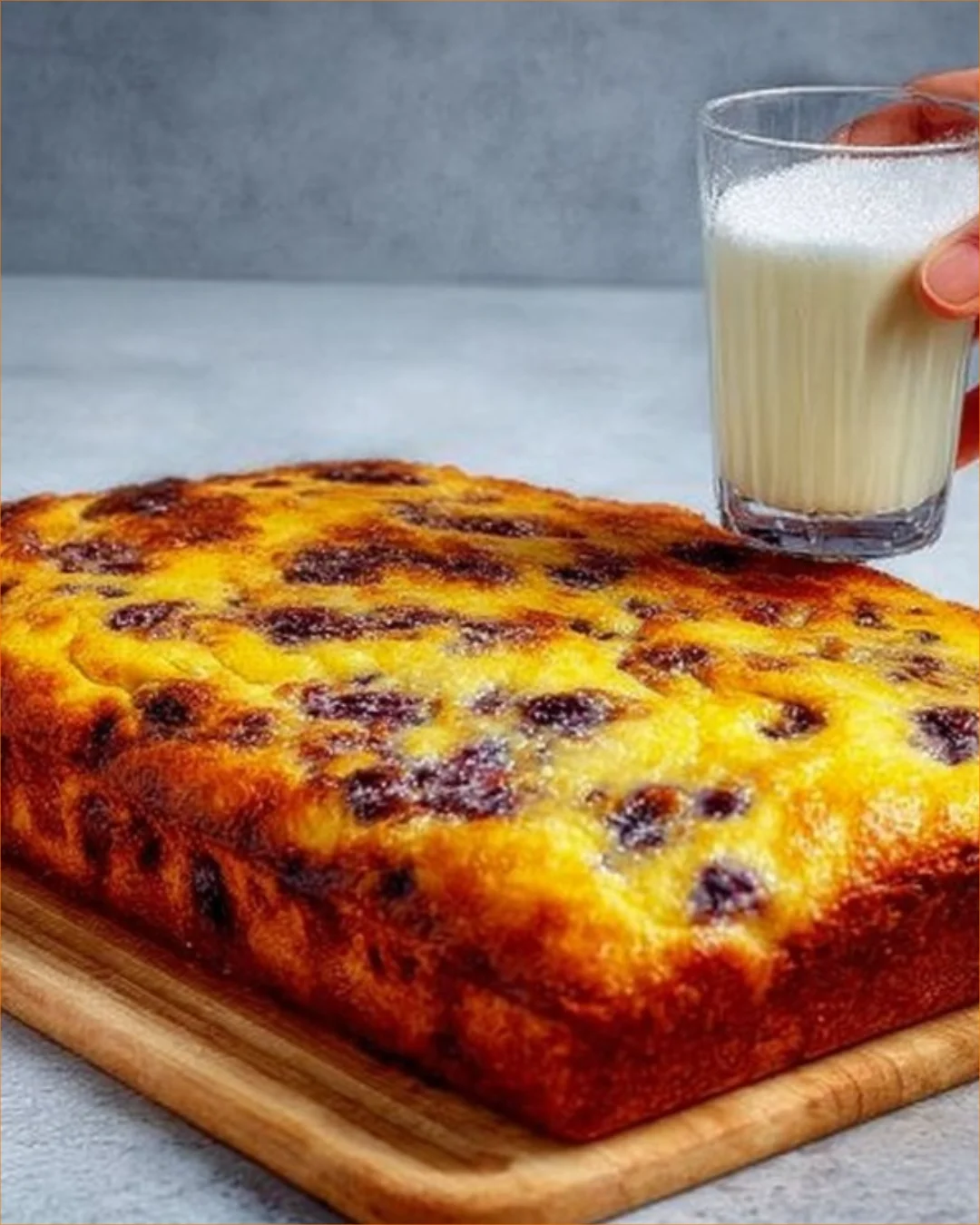 Fluffy currant cake topped with fresh currants and served on a plate