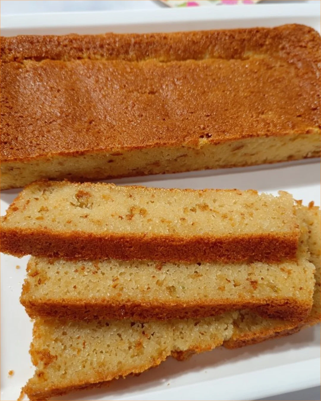Delicious sponge cake topped with creamy orange frosting