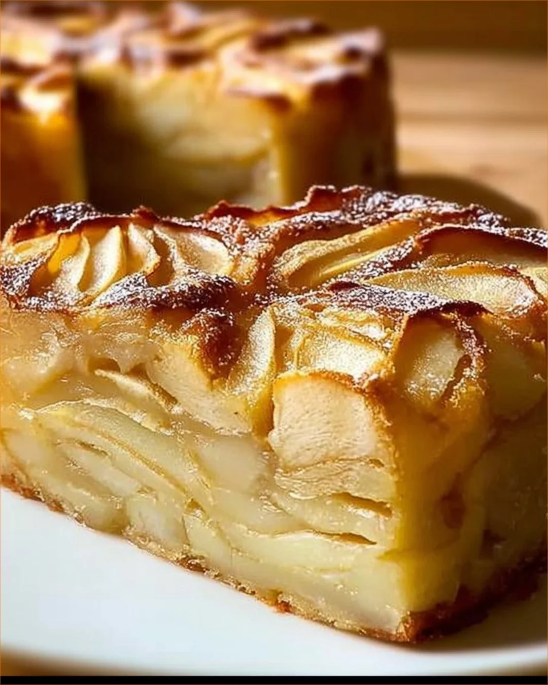 Delicious Invisible Apple Cake showcasing soft texture and fresh apple slices