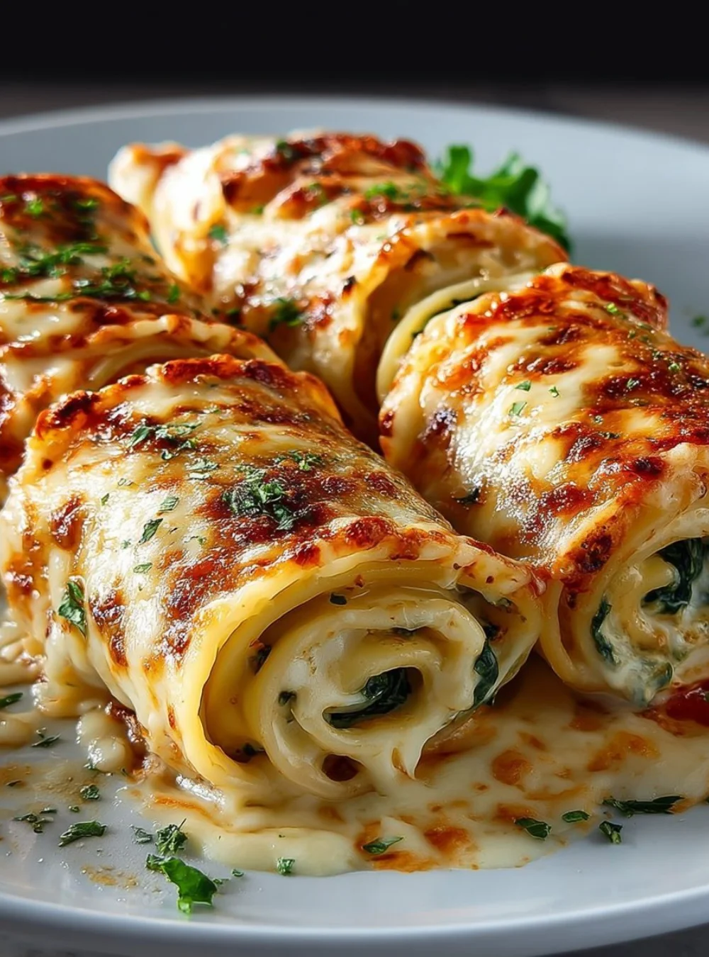 Delicious crispy zucchini crepes served on a plate with fresh herbs