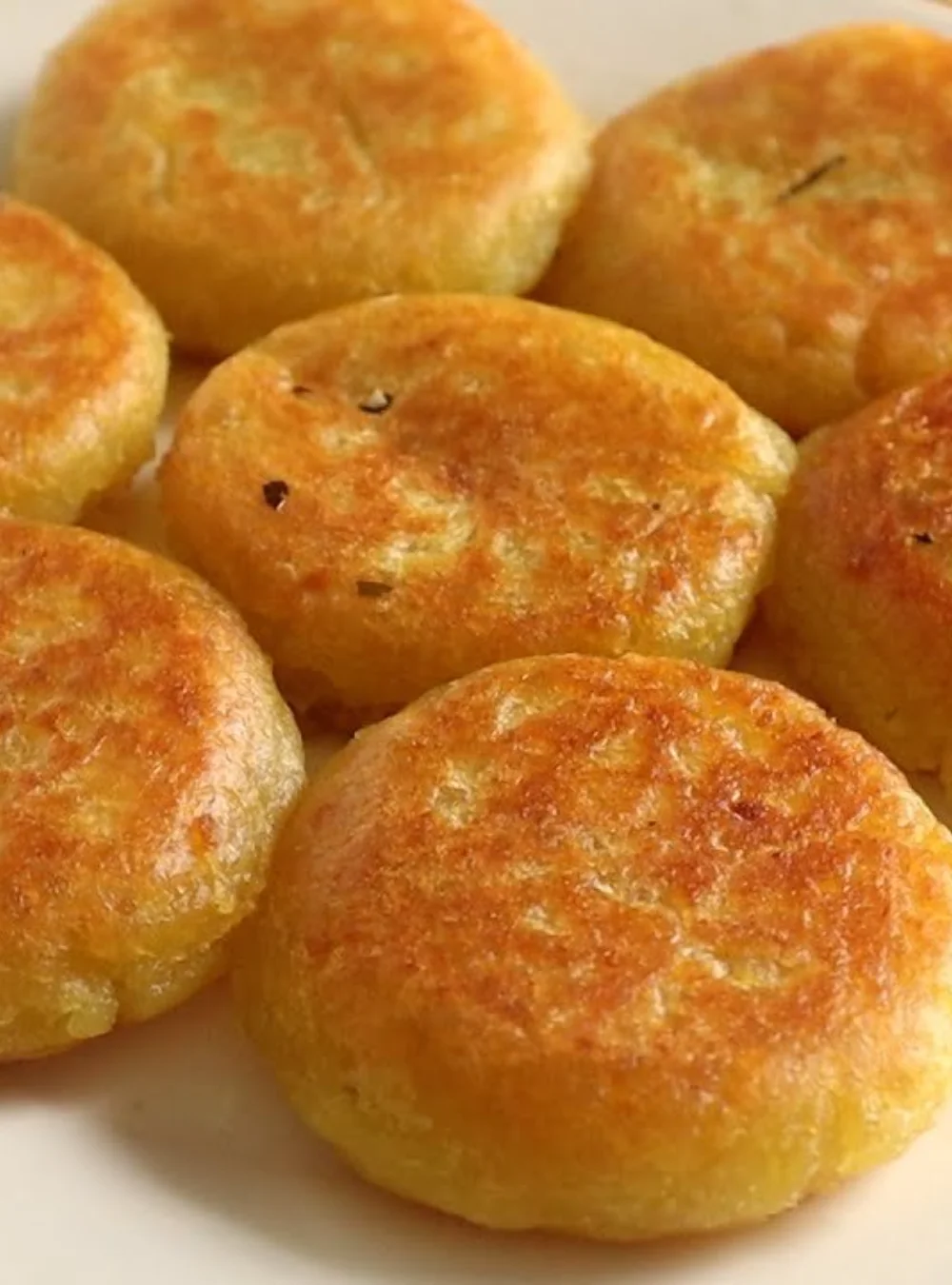 Delicious Sweet Potato Mini Cake topped with cream and nuts