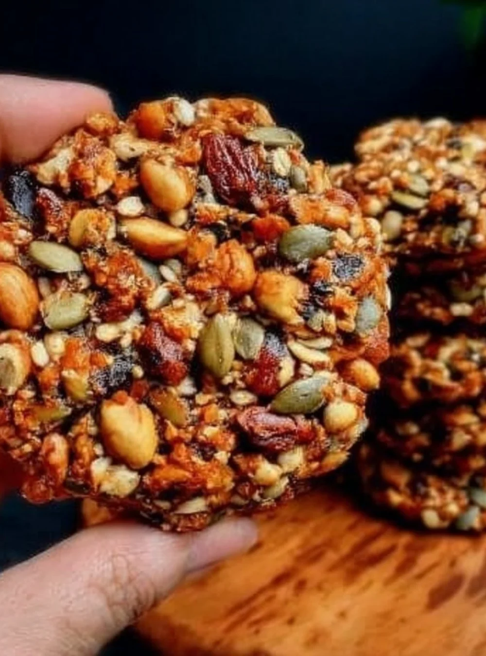 Healthy flourless and sugar-free energy cookies on a wooden table