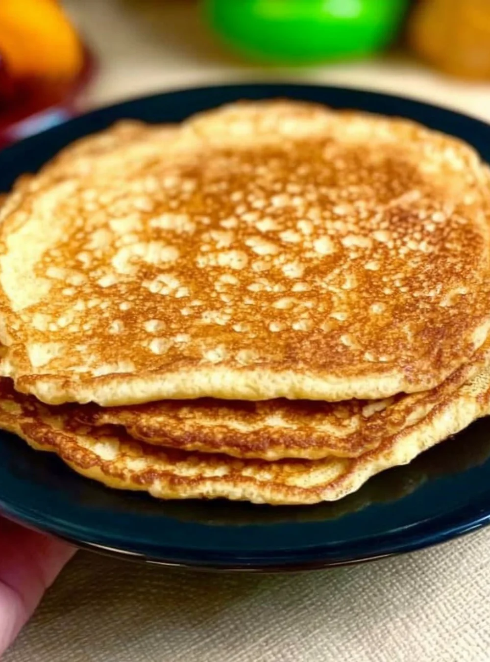 Oatmeal pancakes served with homemade plum compote on a plate